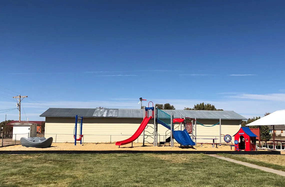 Slides, climbing, and swings at Centennial Park